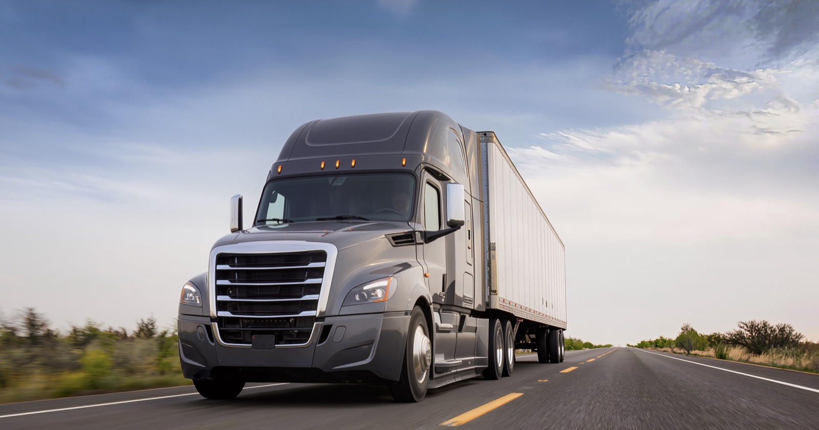 Ryan Logistics truck on an open highway
